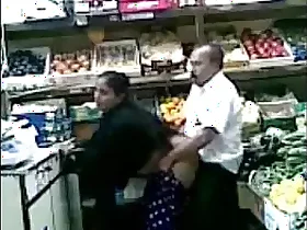 Elderly couple have a secret rendezvous in the grocery store