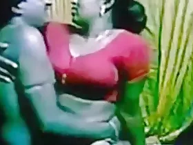 Indian housewife with big tits gets naughty on webcam in red saree